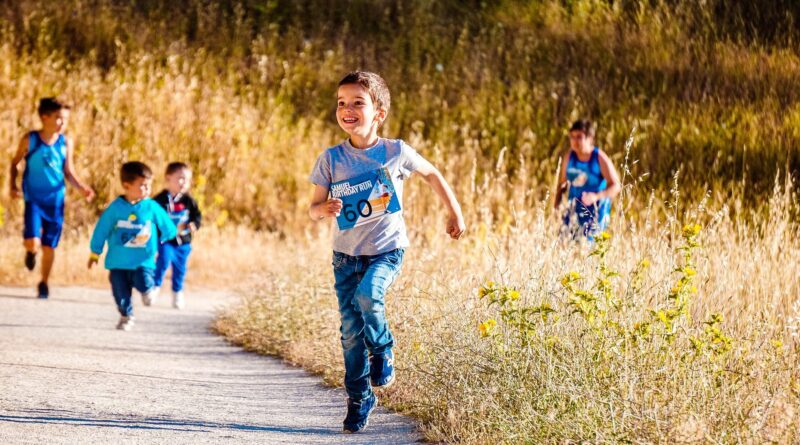 boy running on pathway