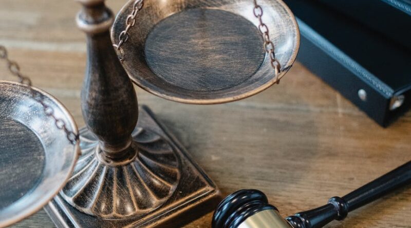 symbols of justice and law on table of judge