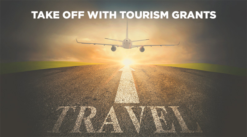 Airplane taking off on a runway. The word Travel with an arrow poi9ntintg to the horizon on the pavement and a bright light in the distance.