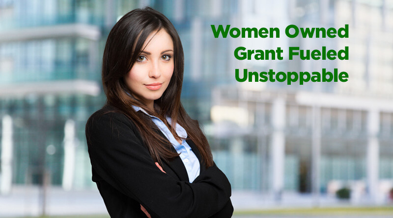 Business women standing with her arms crossed.