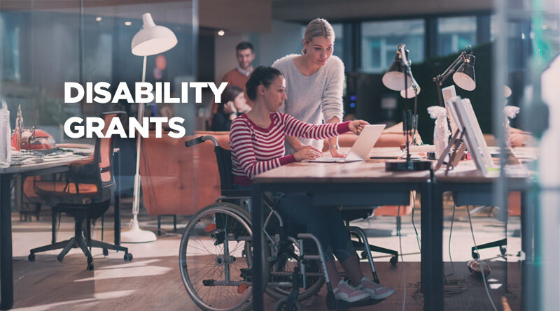 The words Disability Grants over an firl in a wheelchair receiving guidance from another individual.