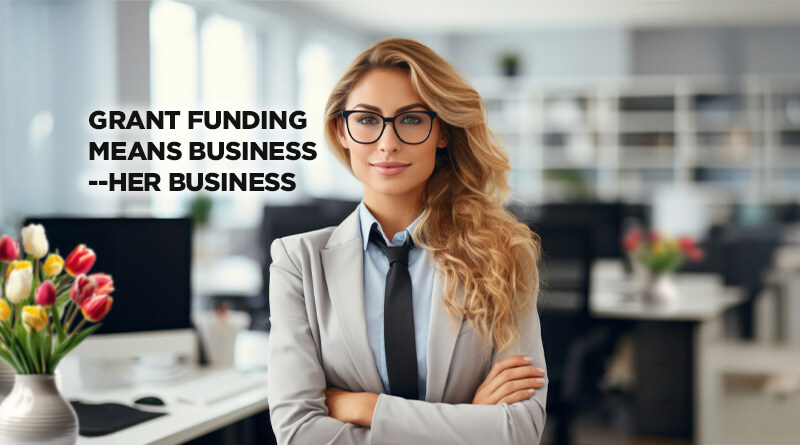 Business woman looking into the camera. Caption reads: Grant Mean Business -- Her Business