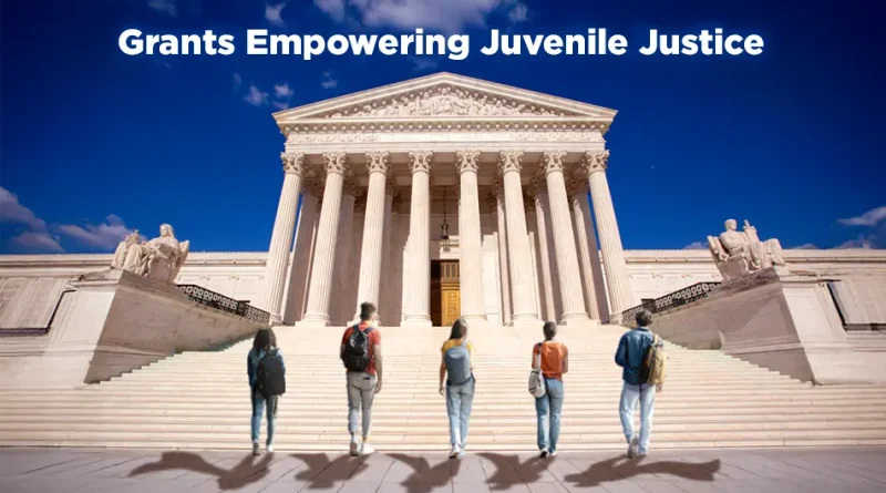 Five young people walking toward a large neoclassical-style courthouse with tall columns, symbolizing justice and law. At the top, the text reads "Grants Powering Juvenile Justice", suggesting a focus on funding or initiatives that support reform or innovation in the juvenile justice system.