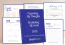 GrantWatch 2026 goal-setting journal titled “Organizing My Thoughts, Manifesting My Goals,” surrounded by sample interior pages including a weekly planner, monthly goals, vision board, gratitude journaling, and a January 2026 reflection page designed for planning, reflection, and achievement.