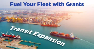 Aerial view of a busy seaport with cargo ships, cranes, and containers, overlaid with the text “Fuel Your Fleet with Grants” and “Transit Expansion,” representing grant funding for transportation and fleet growth.