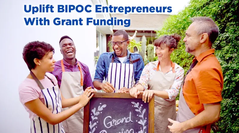 A diverse group of people standing in front of a restaurant for the grand opening of their business. Words above their heads reads "Uplift BIPOC Entrepreneurs with Grant Funding."