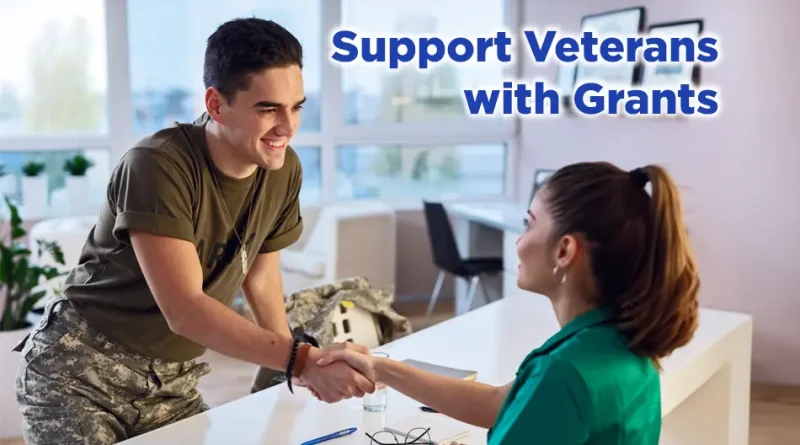 Smiling soldier in casual fatigues shakes hands with nurse over a standing desk. The text reads "Support Veterans With Grants."