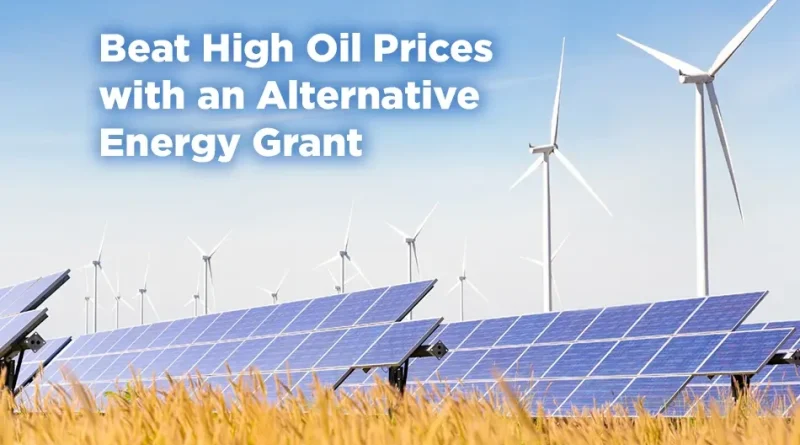Solar panels and wind turbines in a field under a blue sky with text reading “Beat High Oil Prices with an Alternative Energy Grant.” 🌞⚡🌾