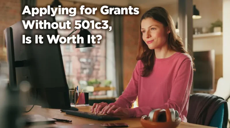 Woman sits at her computer in her home. She is searching for the answer to the question in the caption: "Applying for Grants Without 501c3, Is It Worth It?"