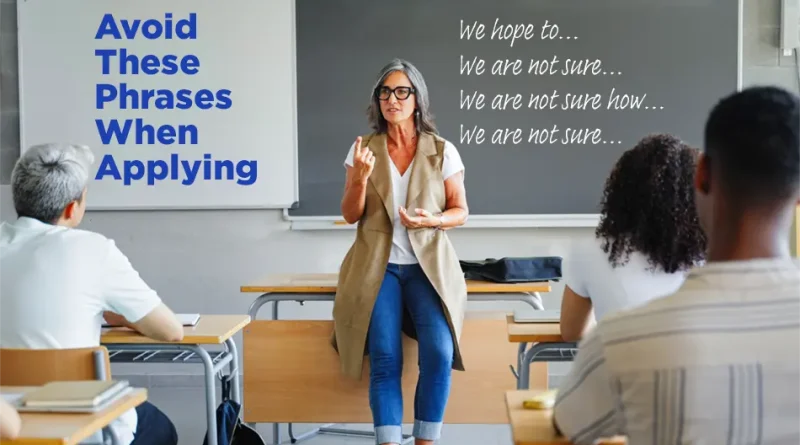 College professor leaning on her desk as she teaches a class. On the board are several examples of wishy-washy, uncertain sentences starters. The caption reads "Avoid These Phrases When Applying."