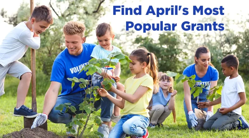 Spring time view of a community planting project, the scene shows volunteers teaching children how to plant and nurture growing things.