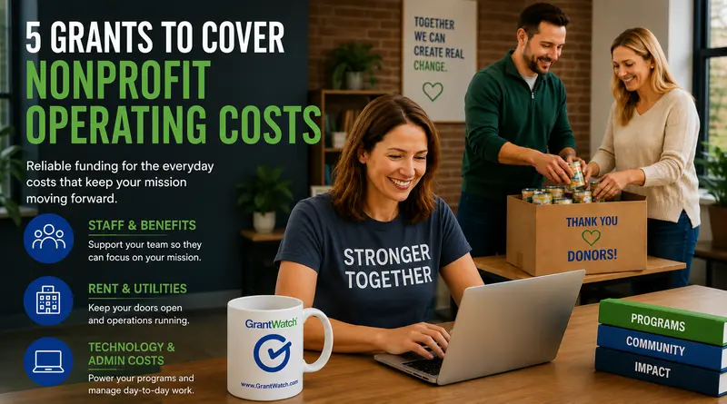 Smiling nonprofit staff members and volunteers work together in an office while packing donation boxes and managing tasks on a laptop. Text on the image reads “5 Grants to Cover Nonprofit Operating Costs” with examples including staff and benefits, rent and utilities, and technology and admin costs. GrantWatch branding appears on a coffee mug beside the computer, while books labeled programs, community, and impact sit nearby.