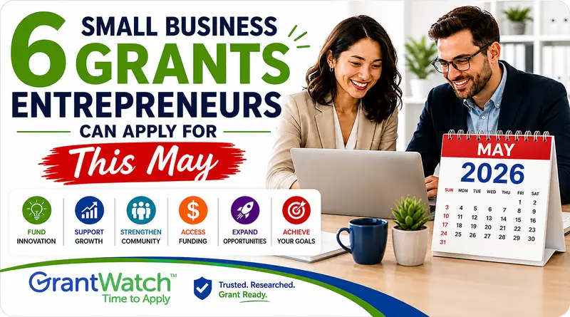 A promotional graphic for GrantWatch featuring the headline “6 Small Business Grants Entrepreneurs Can Apply for This May” in bold green and blue text. On the right side, two smiling business professionals sit at a desk looking at a laptop in a bright office setting. A desktop calendar displays May 2026. Along the bottom are colorful icons with phrases including “Fund Innovation,” “Support Growth,” “Strengthen Community,” “Access Funding,” “Expand Opportunities,” and “Achieve Your Goals.” The GrantWatch logo appears at the bottom beside the slogan “Trusted. Researched. Grant Ready.”