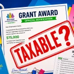 When Are Grants Considered Taxable Income? Grant award notification letter with a large “Taxable?” stamp, IRS Form 990, calculator, compliance notes, and GrantWatch coffee mug on a desk.