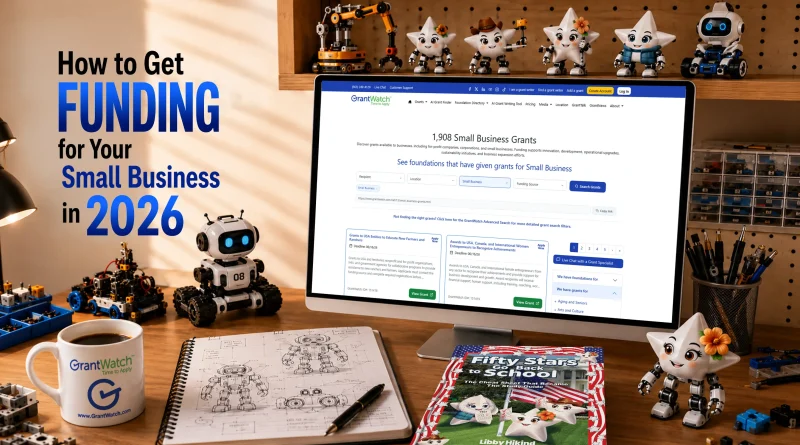 Desktop workspace with a computer displaying GrantWatch small business grants, surrounded by educational robots, robotics blueprints, and a book. Large text reads, “How to Get Funding for Your Small Business in 2026.” GrantWatch-branded coffee mug on desk.