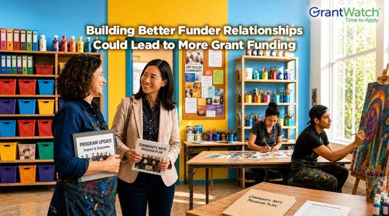 Two nonprofit professionals smile while talking in a bright community art classroom as students create artwork in the background. Overlaid text reads, "Building Better Funder Relationships Could Lead to More Grant Funding." The image highlights the importance of developing strong relationships with funders to support nonprofit programs and increase grant funding opportunities