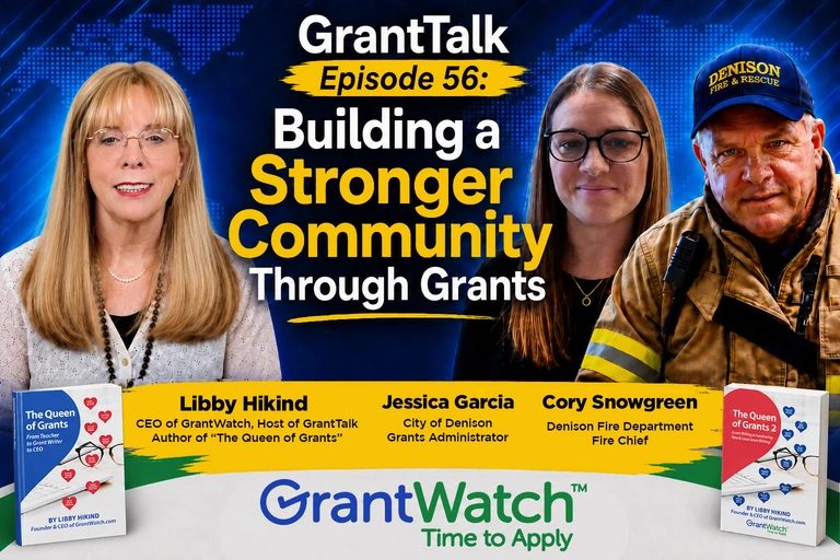 Promotional graphic for GrantTalk Episode 56, "Building a Stronger Community Through Grants." The image features GrantTalk host Libby Hikind, CEO of GrantWatch and author of The Queen of Grants, alongside Jessica Garcia, Grants Administrator for the City of Denison, and Cory Snowgreen, Fire Chief of the Denison Fire Department. The blue background includes a world map design and bold yellow and white text highlighting the episode title. GrantWatch branding and images of Libby Hikind's books appear at the bottom of the graphic.